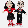 Two dolls dressed in red and black outfits with striped socks on a white background